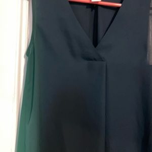 Emerald green sleeveless deep v-neck blouse